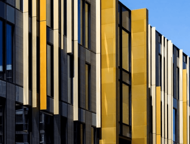 Yellow cladding panels on the walls at theUniversity of Birmingham Library